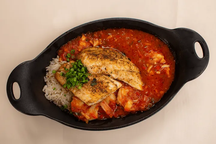 Fish And Rice Dish With Sauce