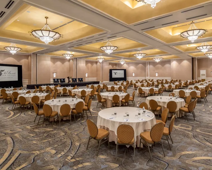 Crecent Ballroom Set Up For A Conference With Circular Tables